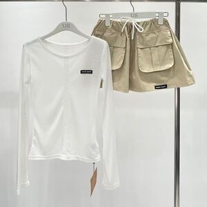 Miu Miu base layer top and workwear skirt set